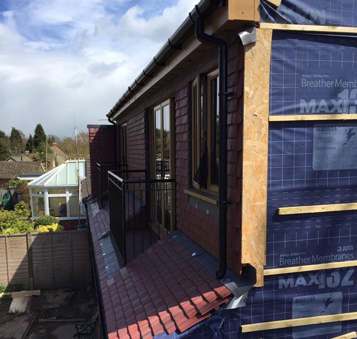 Roof work and side of a house repair